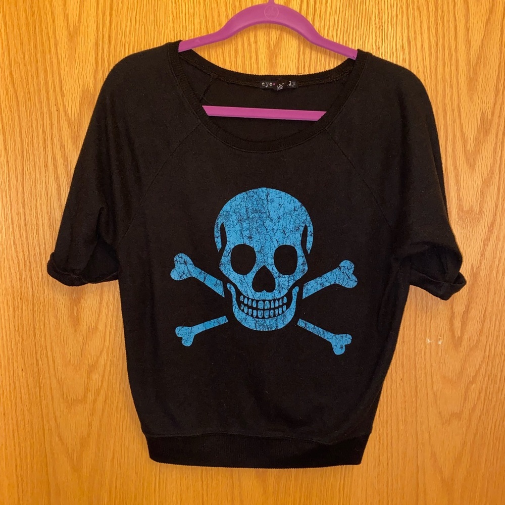 Black sweater with blue skull